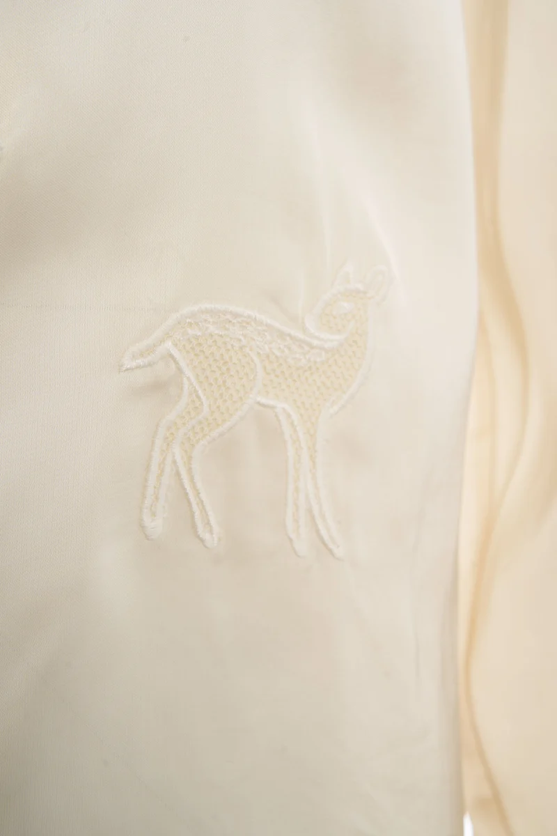Blusa con ricami