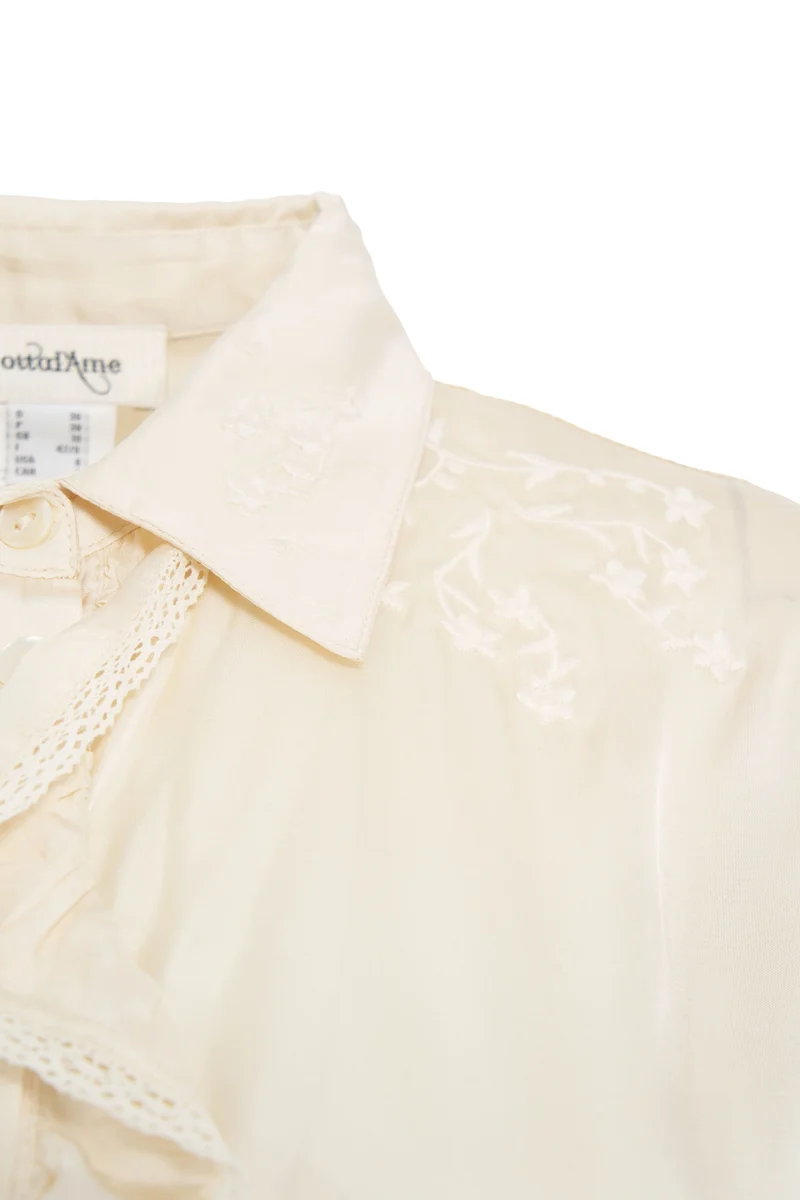 Blusa con ricami