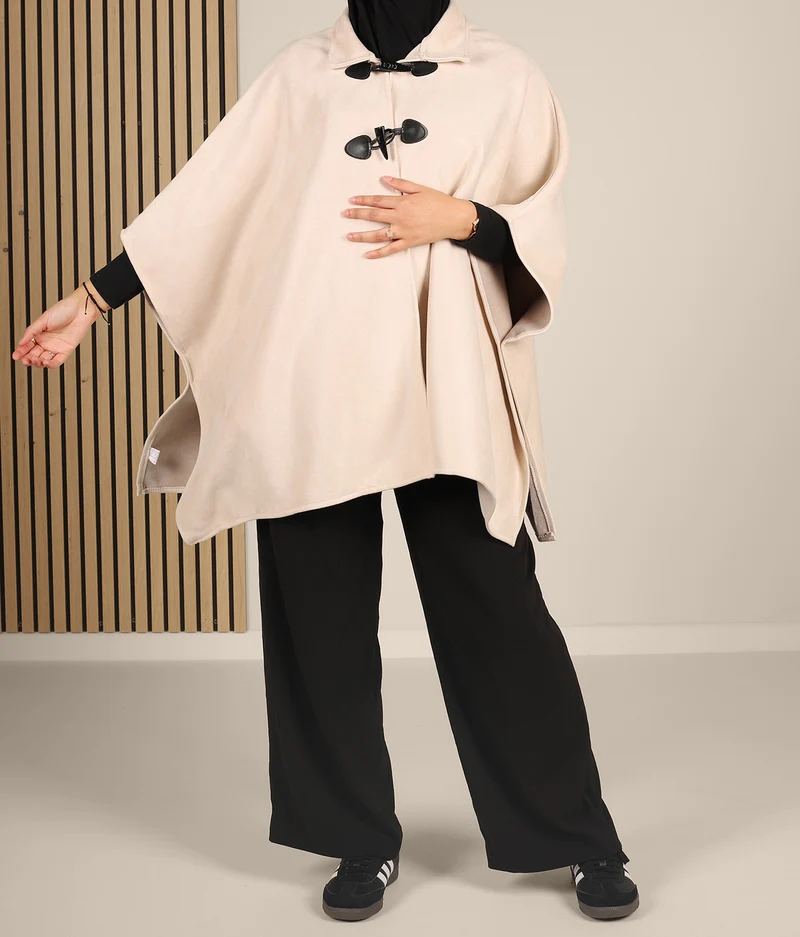 Poncho aus Wildleder
