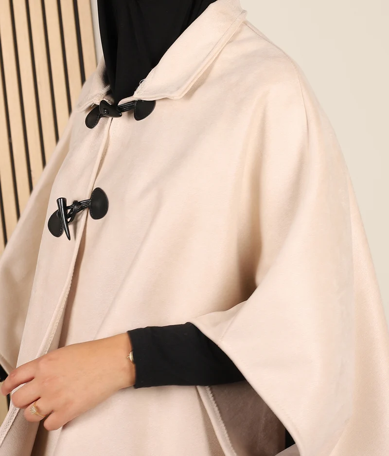 Poncho aus Wildleder