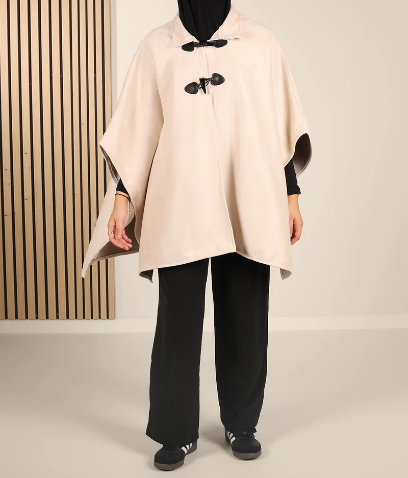 Poncho aus Wildleder