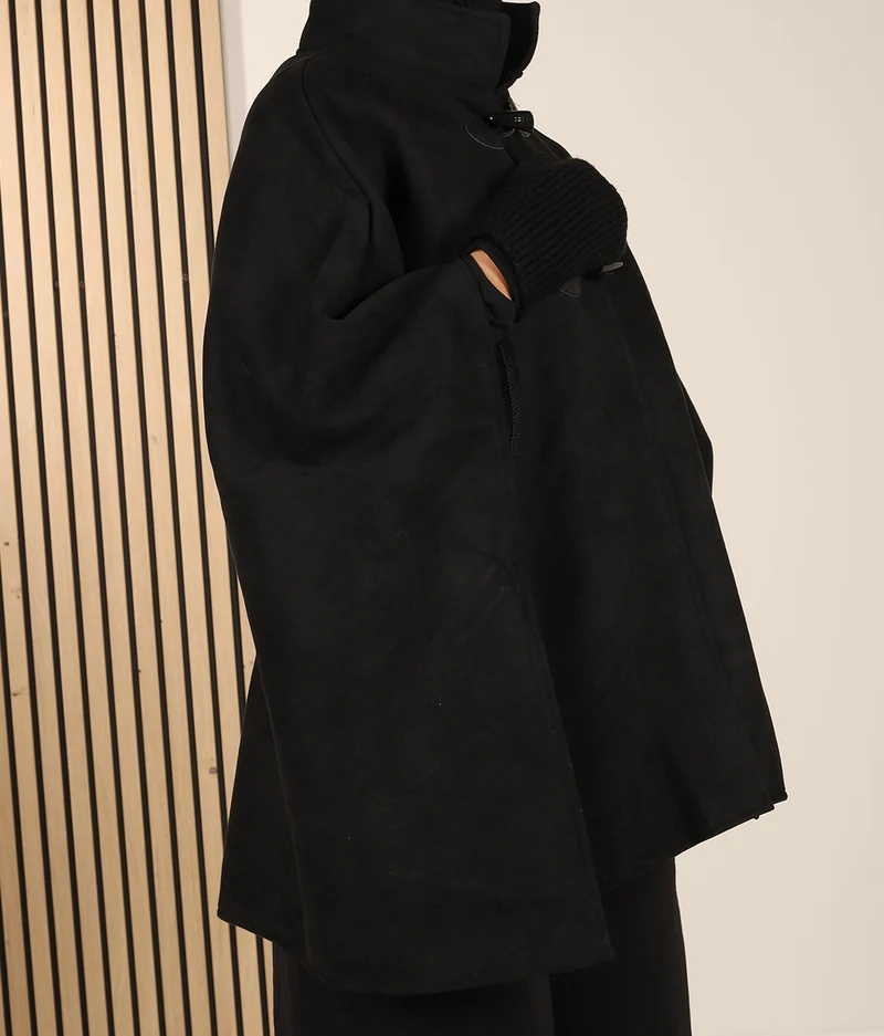Poncho aus Wildleder