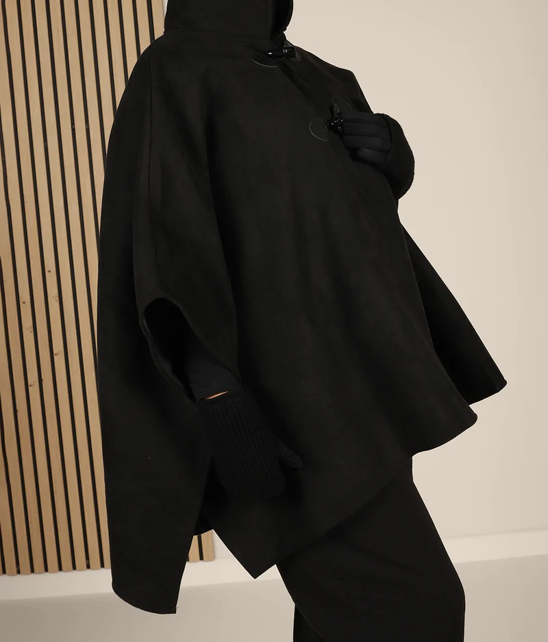 Poncho aus Wildleder