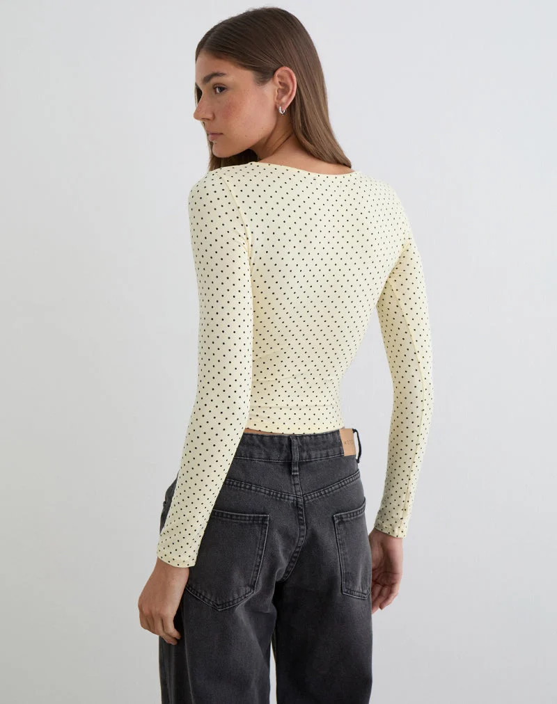 Kline Langarm-Oberteil mit Schleife vorne aus Rayon-Jersey mit Mikro-Polka-Muster in Creme