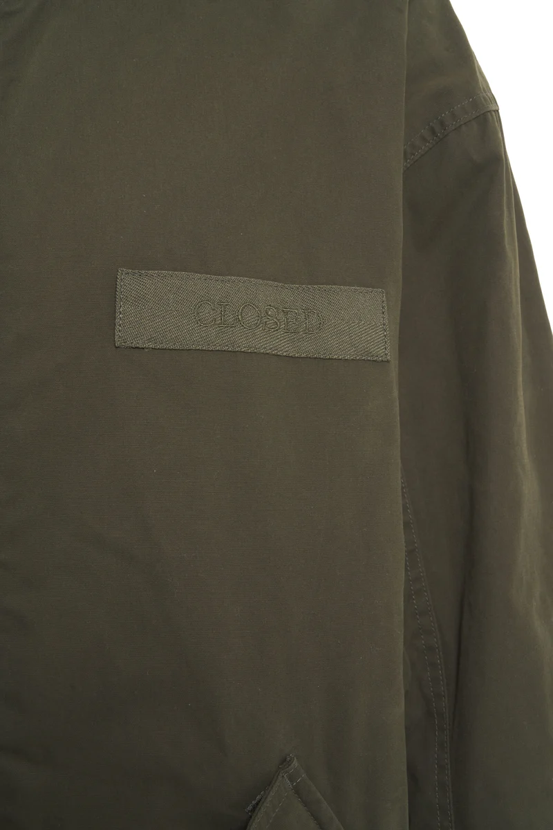 Parka con tasche a patta