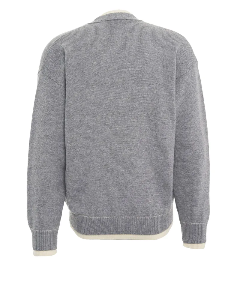Cardigan con chiusura a bottoni nascosta