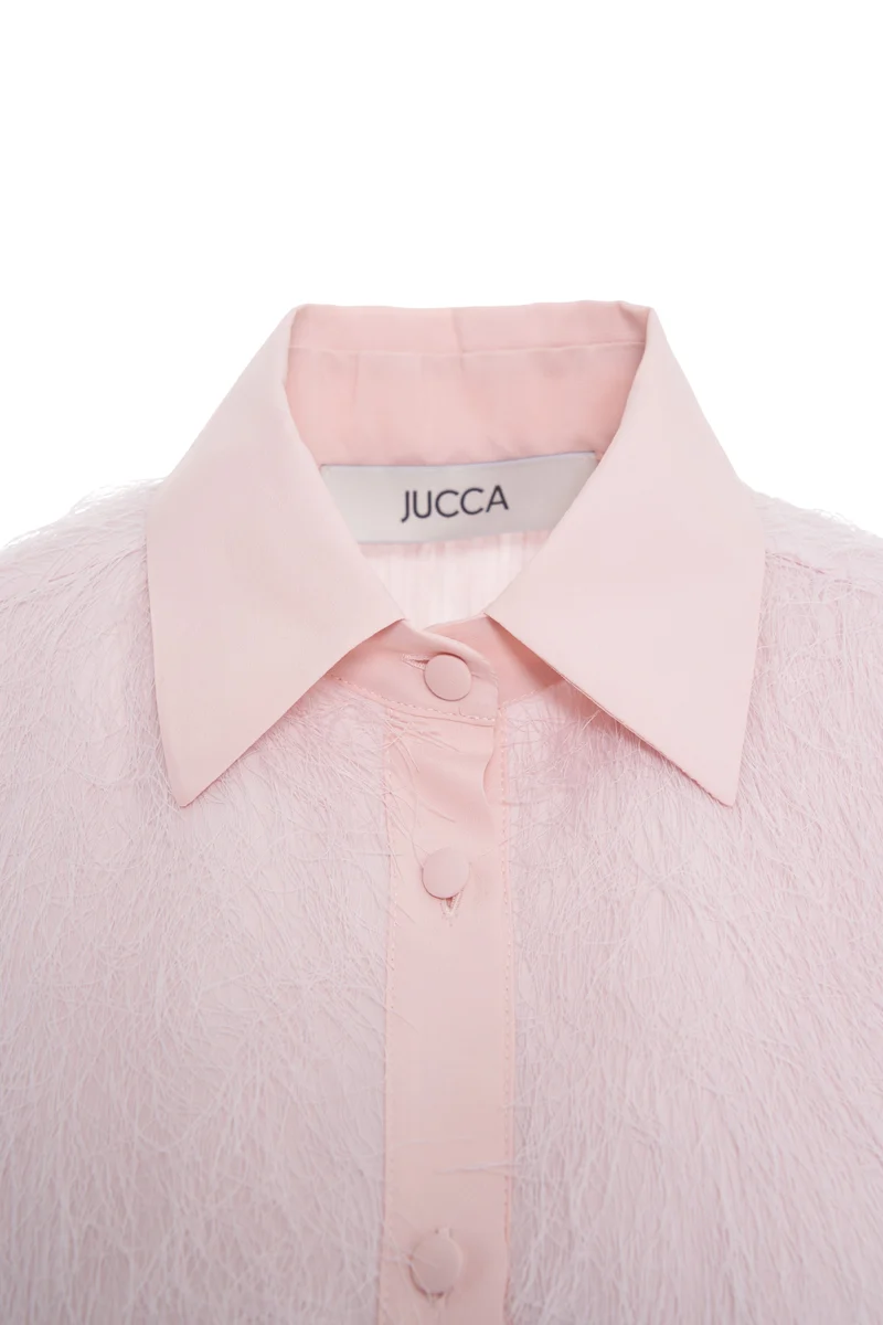 Blusa con dettagli di frange