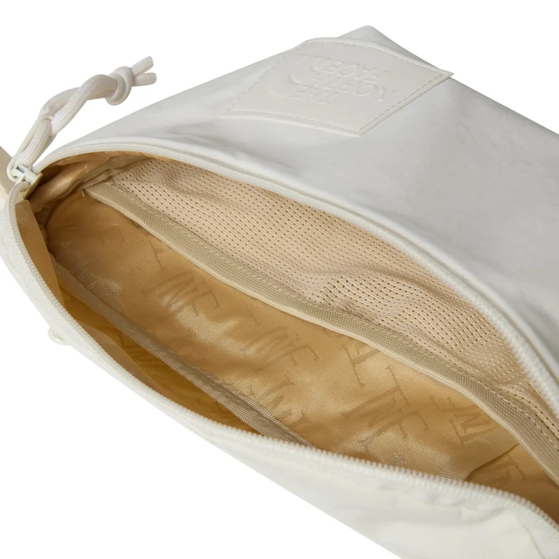 The North Face We Never Stop Lumbar - Bolso bandolera 26 cm (white dune)