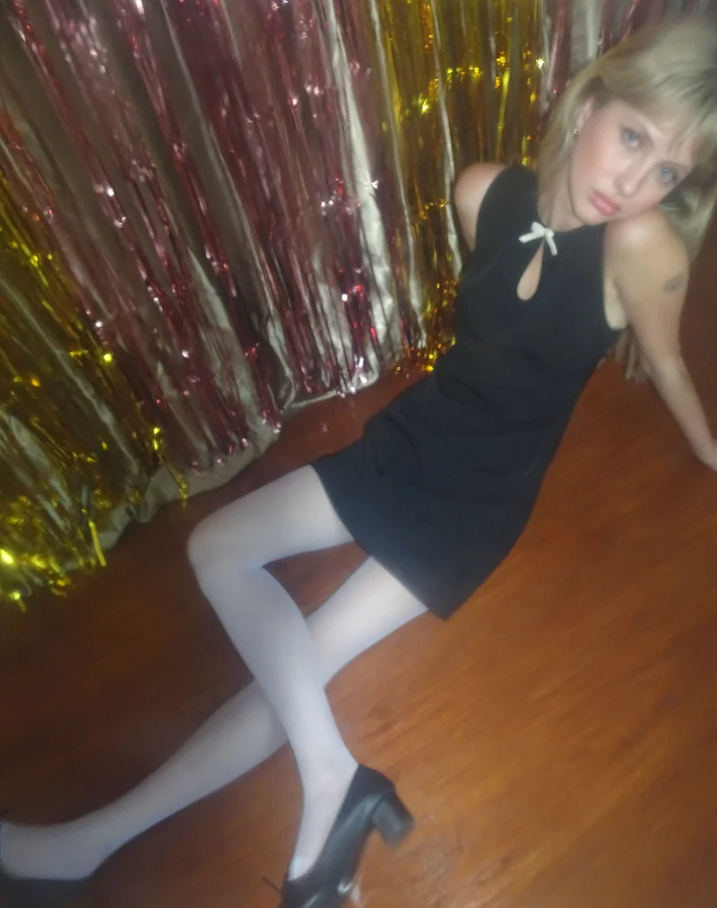 Bibidia Minikleid in Schwarz mit cremefarbener Schleife