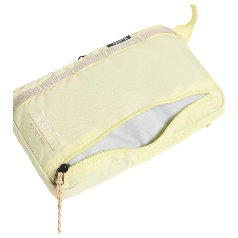 Haglöfs Tight Pocket Bag - Bolso bandolera 16.5 cm (yellow rise/chalk beige)